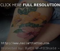 hawaiian flower ankle tattoos