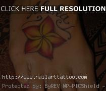 hawaiian flower foot tattoos