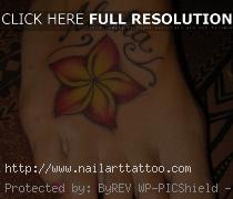 hawaiian flower foot tattoos