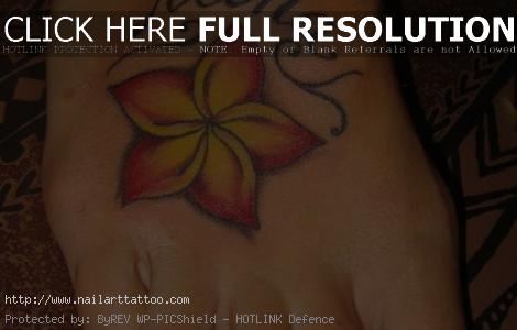 hawaiian flower foot tattoos