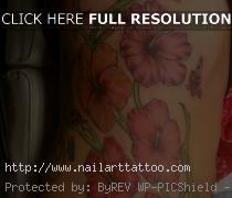 hawaiian flower rib tattoos