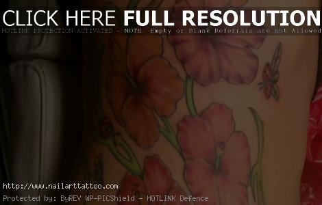 hawaiian flower rib tattoos