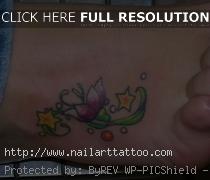 simple flower ankle tattoos