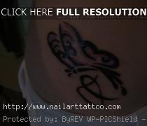 small flower hip tattoos