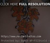 tribal flower back tattoos