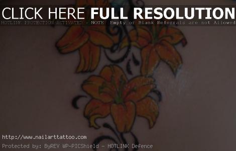 tribal flower back tattoos