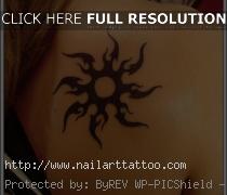 tribal flower back tattoos for women