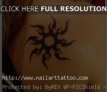 tribal flower back tattoos for women