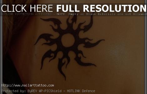 tribal flower back tattoos for women
