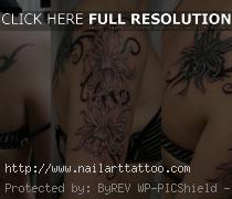 tribal flower cover up tattoos