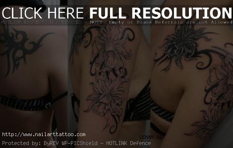 tribal flower cover up tattoos