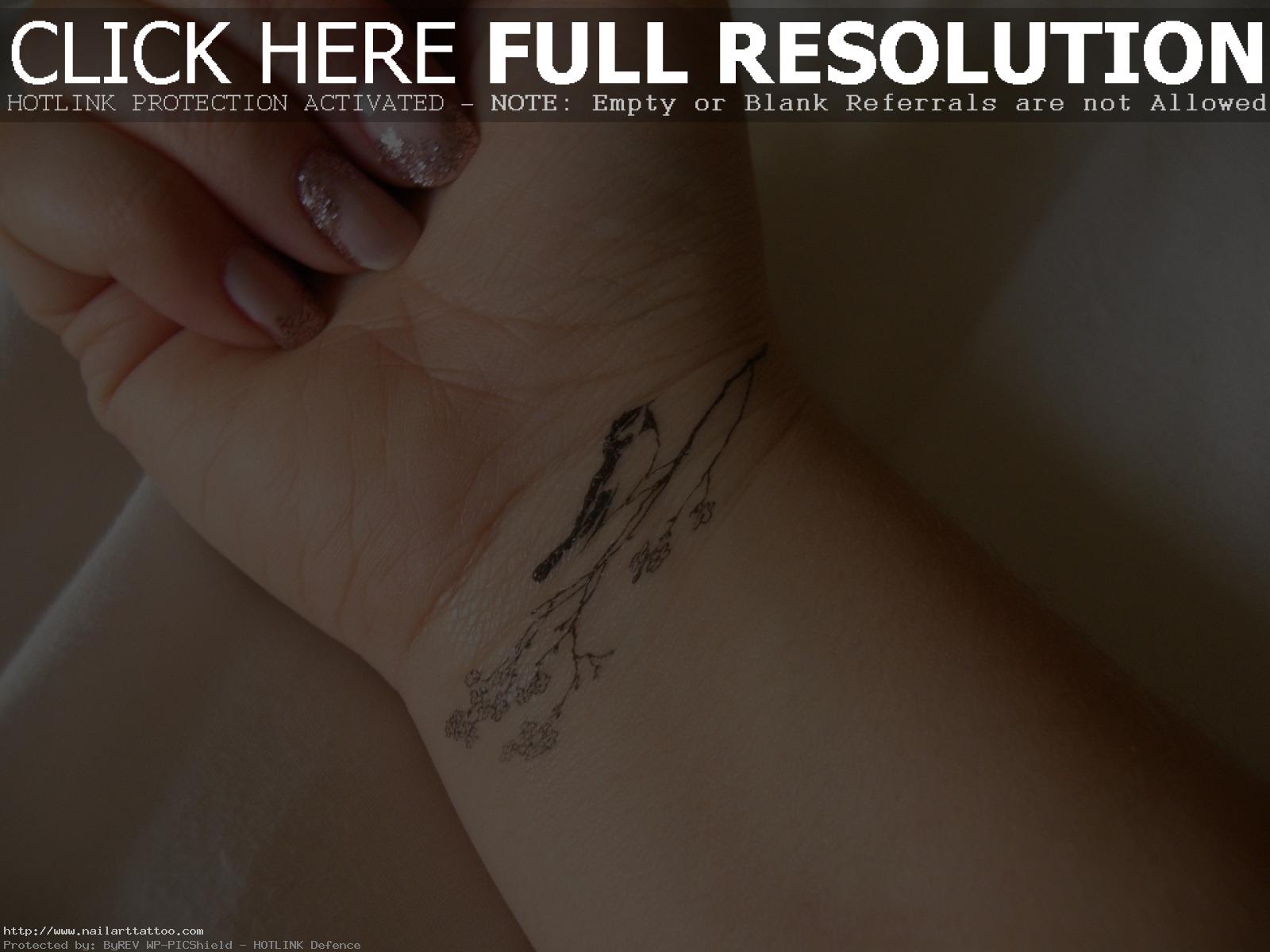 Bird on Wrist Tattoo