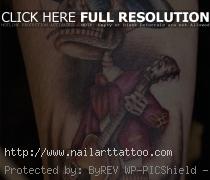 David Sanchez tatoo art — skeleton guitarist