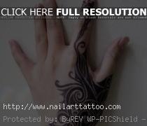Tribal Inspired Hand Tattoo