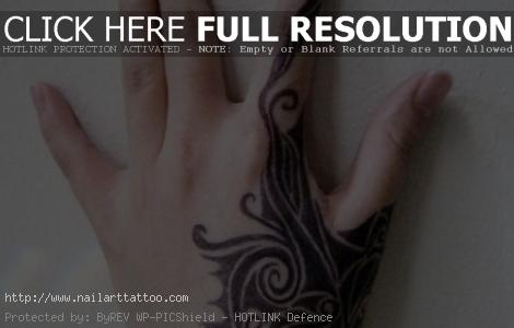Tribal Inspired Hand Tattoo