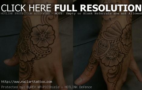Cory Ferguson – flower hand tattoo