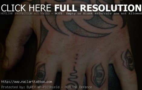 Maori-style tribal hand tattoos