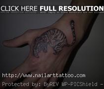 Tiger on Hand tattoo – Kaplan by baranoid