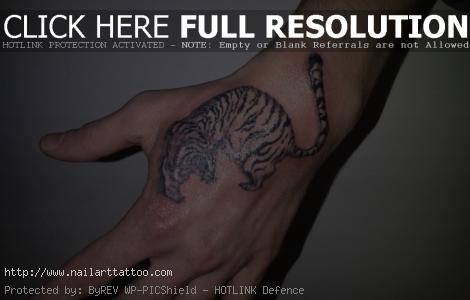 Tiger on Hand tattoo – Kaplan by baranoid
