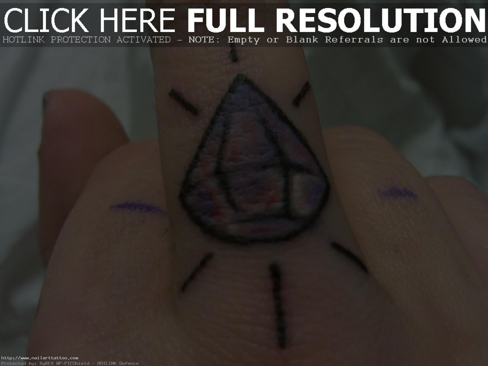 diamond tattoo on finger