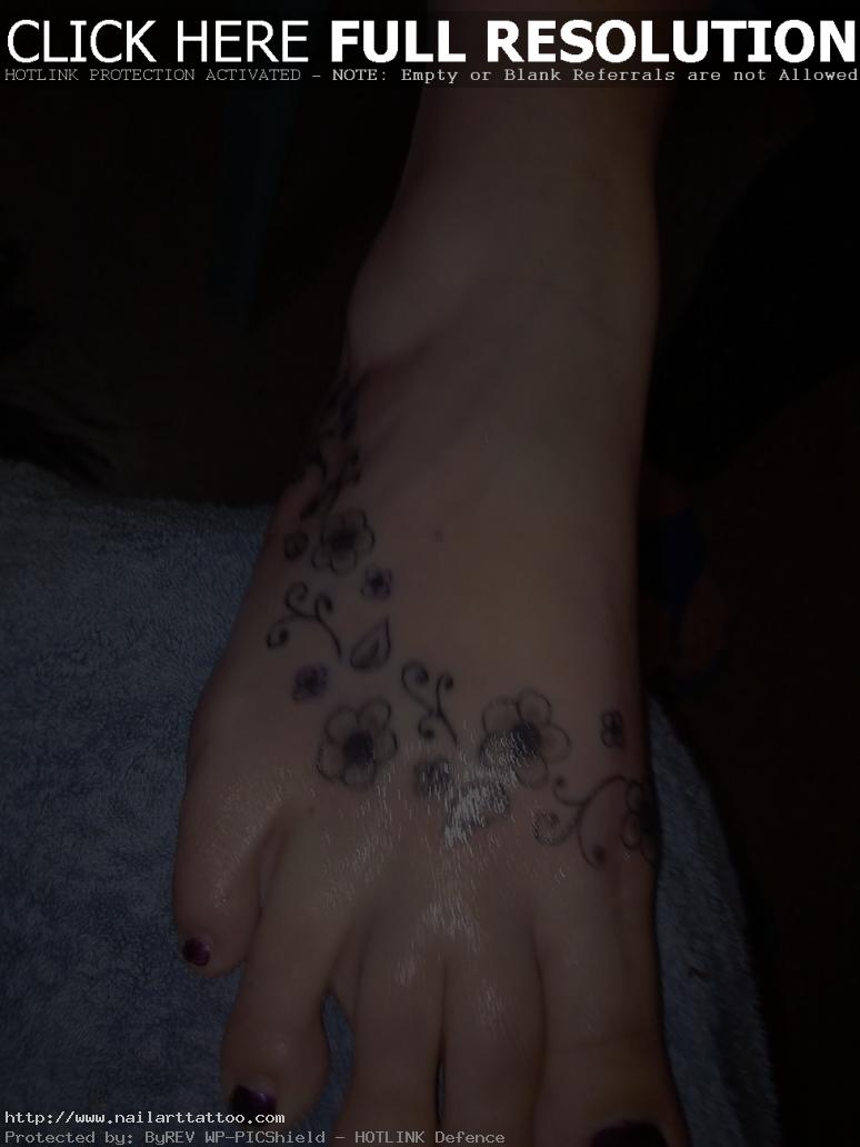 Freehand foot tattoo by kinkypsycho