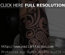 Bold Tribal Forearm Tattoo