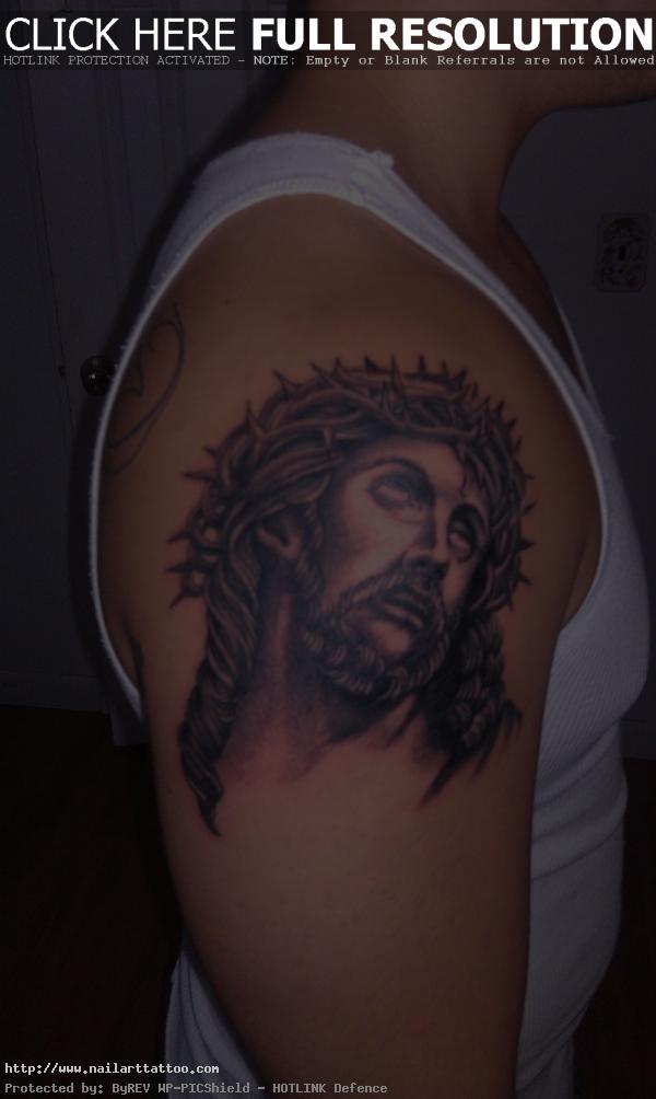 jesus arm tattoo