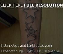 stars and smoke dotwork forearm tattoo