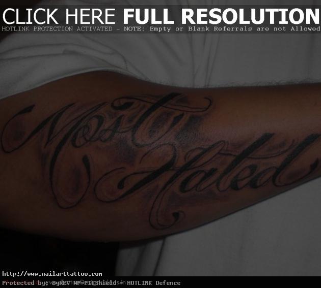 t1 wording forearm tattoo