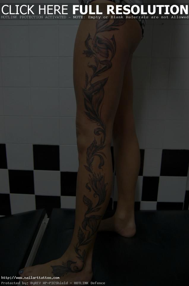 1331142593 flower tattoo leg