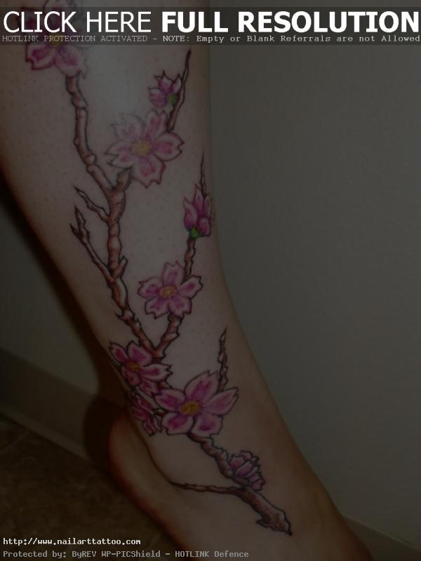 cherry blossom leg tattoo