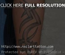 design of tribal tattoo looks simple but very nice if embedded on leg