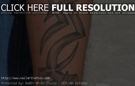 design of tribal tattoo looks simple but very nice if embedded on leg