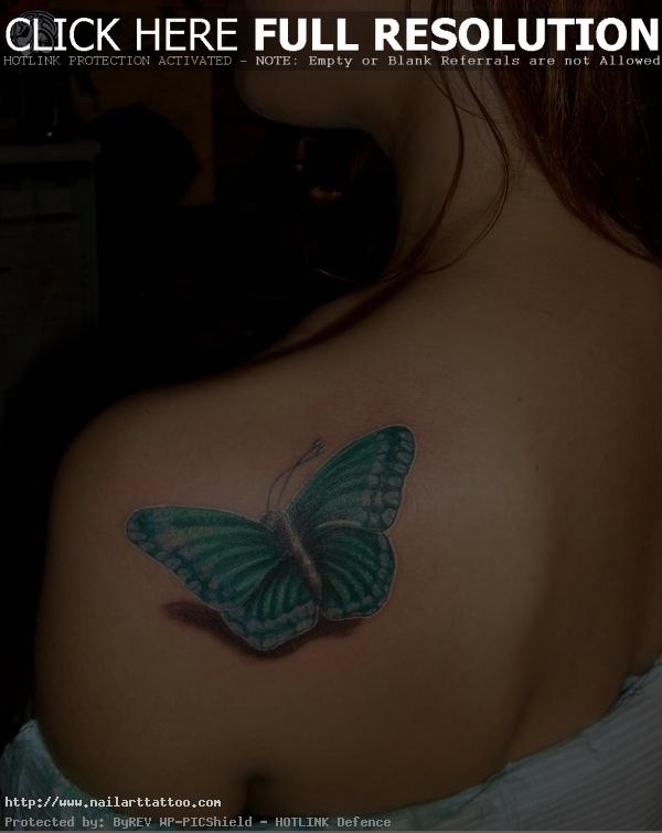 light blue butterfly tattoo on shoulder